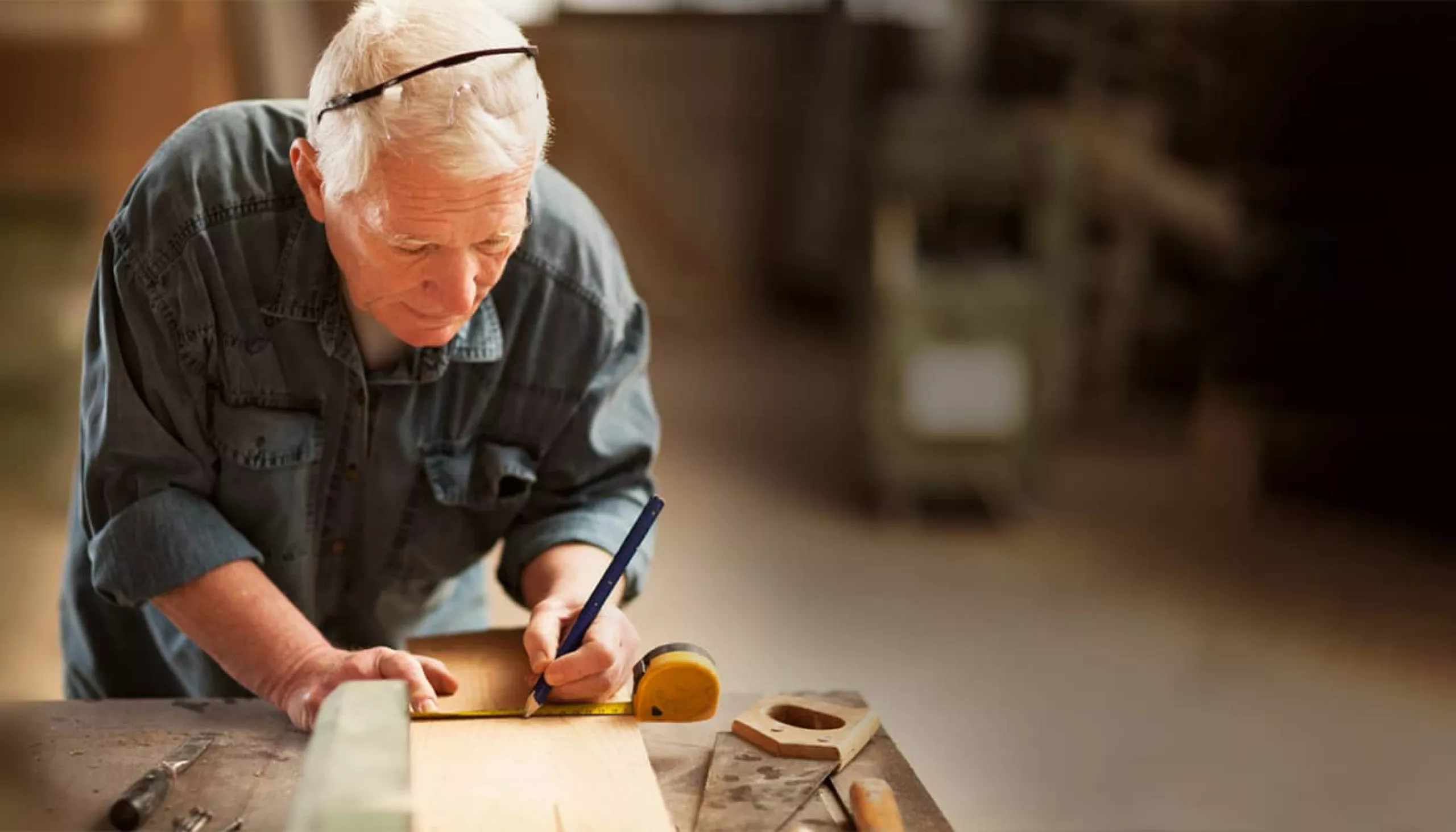 Older man working with hands